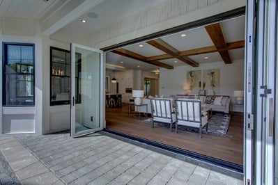 Large sliding door opens great room to the outdoor space.