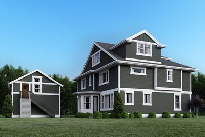 Exterior elevation of the back of the home showing  a landscaped yard and access to an above garage ADU.