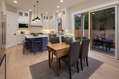 Dinning space sits next to large slider leading to outdoor living.