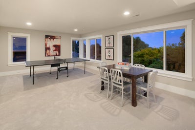 Bonus room with space for a ping pong table and card game table.