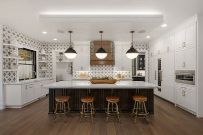 Large kitchen with oversized island and bar seating