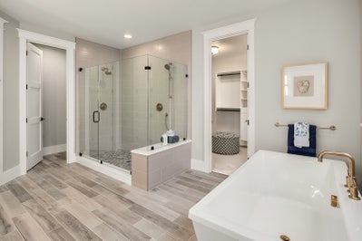 Large master bathroom with soaking tub and large walk in shower.